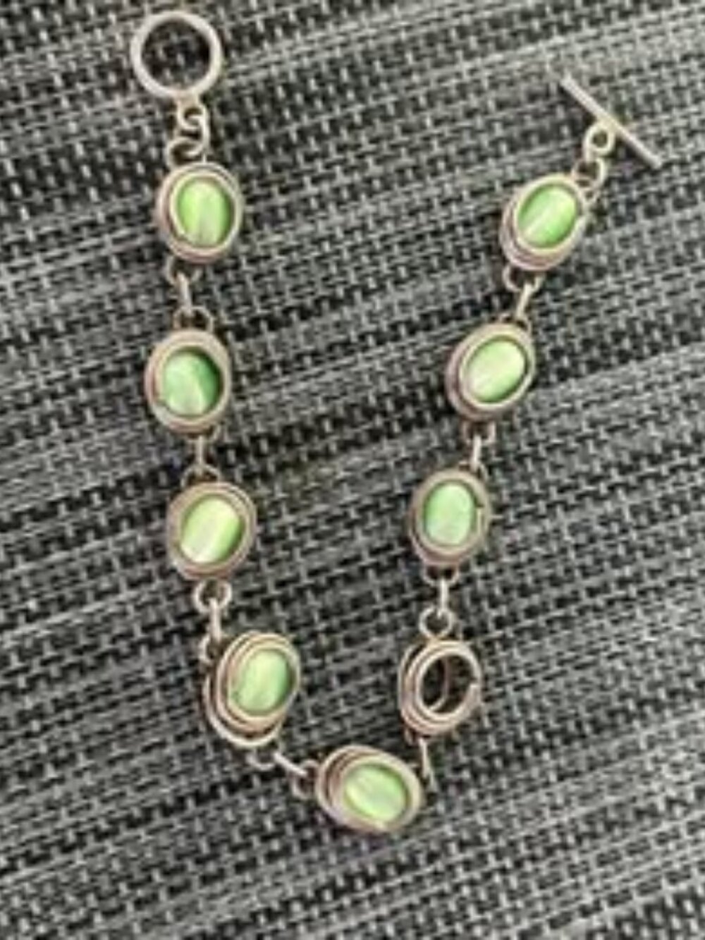 Cats eye bracelet. Artisan created. Missing an eye. Selling hoping someone will